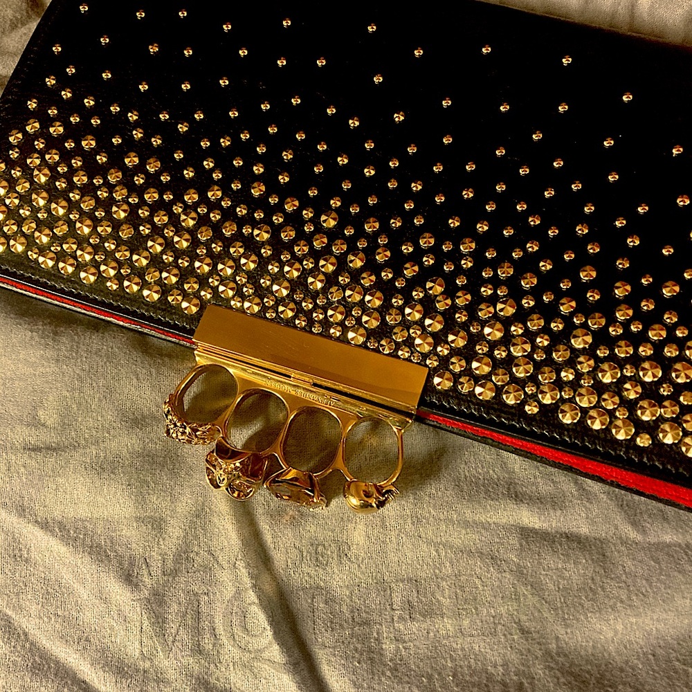 Brand new. Genuine Alexander McQueen clutch. With stones.